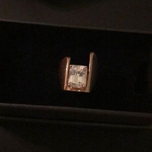 18k gf.  Unique Cz solitaire.